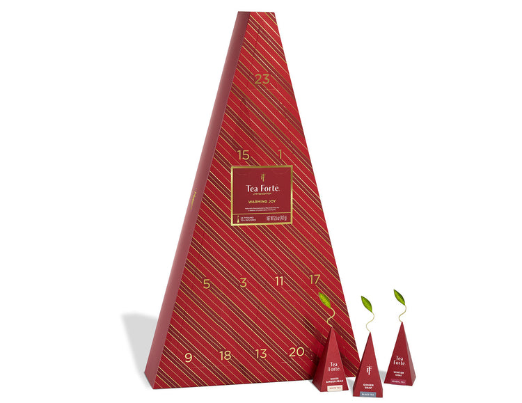 Warming Joy Advent Calendar with doors closed and infusers to the right outside of box