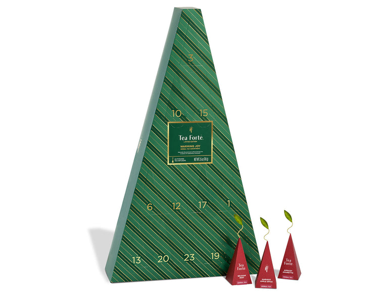 Warming Joy Herbal Advent Calendar with doors closed and infusers to the right outside of box