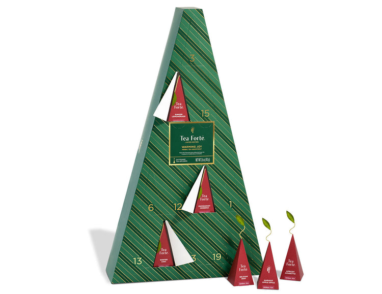 Warming Joy Herbal Advent Calendar with doors open and infusers to the right outside of box