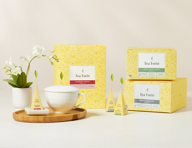 40 count group photo of multiple boxes along with tea cup and pyramids