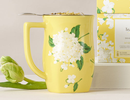 Hydrangea Fiore Steeping cup with lid off and loose tea inside with a tulip