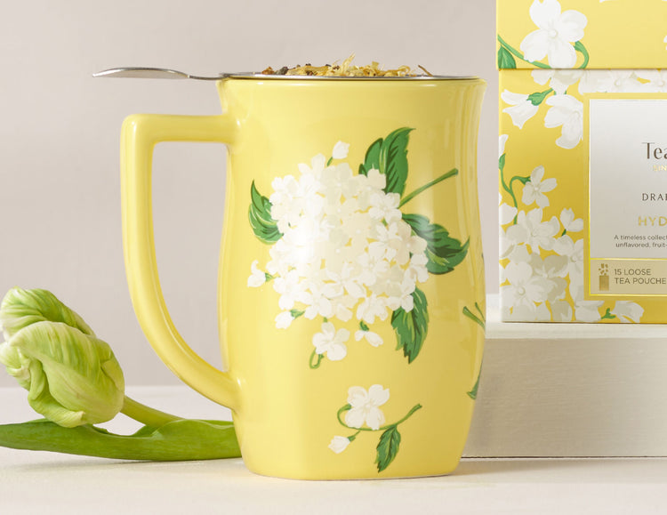 Hydrangea Fiore Steeping cup with lid off and loose tea inside with a tulip