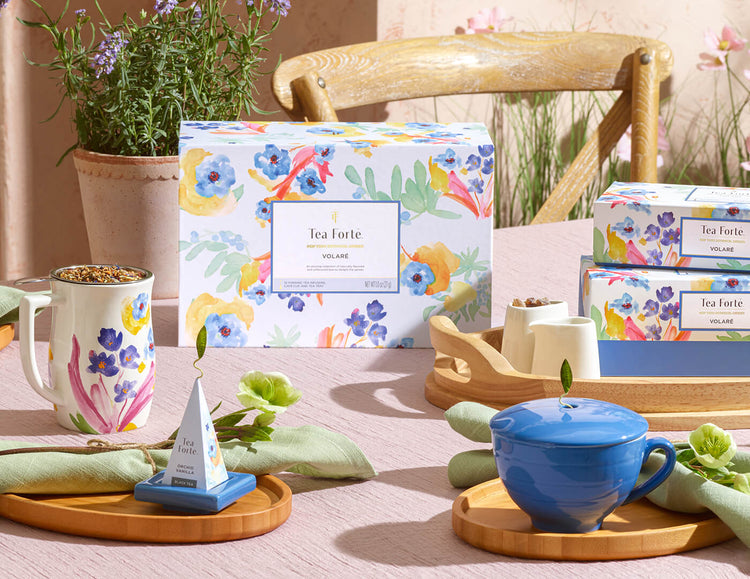 Volare Gift Set box on a table set with cups, Tea Trays and boxes of tea.