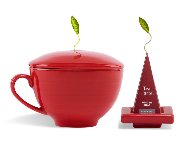 Ruby Red Café Cup with cover and Ruby Red Tea Tray with an infuser on top