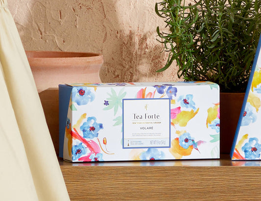 Volare Presentation Box, closed box, of 20 pyramid teas, one wooden table with rosemary plant