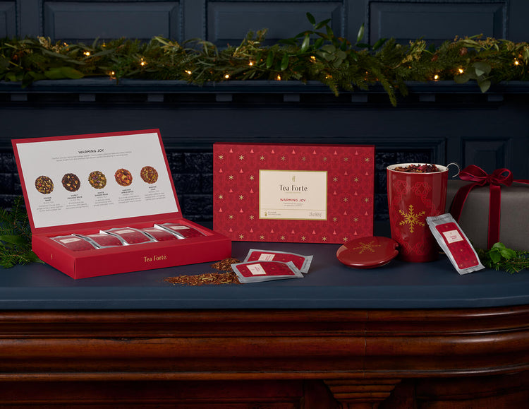 Single Steeps Warming Joy on table with box open and cup