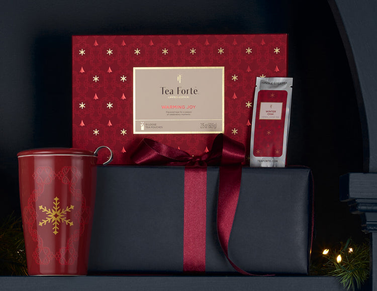 Single Steeps Warming Joy Box closed facing forward with pouch and cup