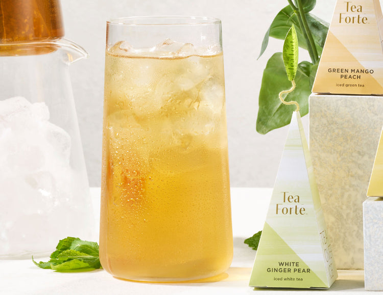 MAIN PDP | White Ginger Pear Iced tea in a tall glass with pyramid infuser