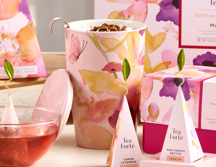 Mariposa Kati Steeping Cup, open with lid and pyramid infuser