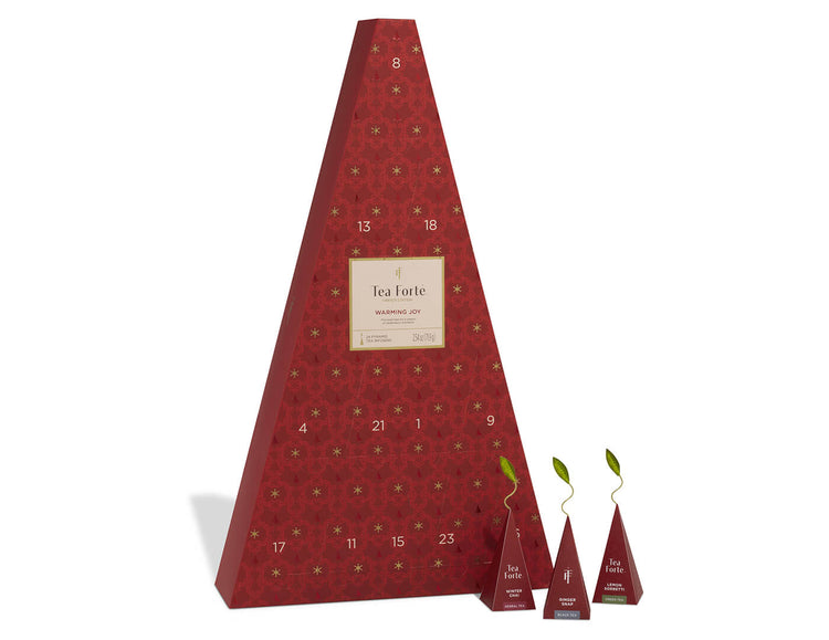 Warming Joy Advent Calendar with doors closed and infusers to the right outside of box
