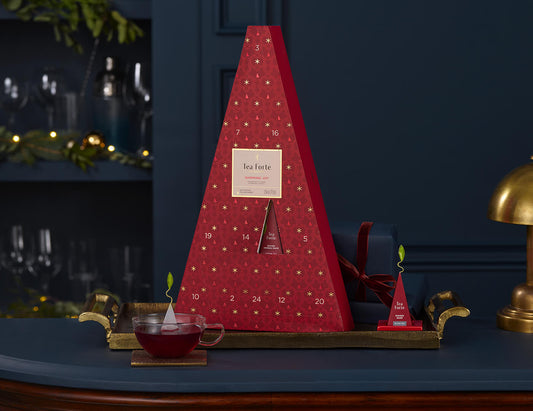 Warming Joy Advent Calendar with teacup and infuser and open door