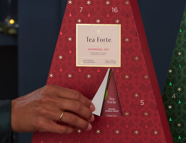 Close up opening a door of a Warming Joy Advent Calendar