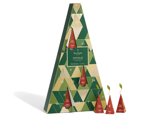 Warming Joy Herbal Advent Calendar with doors open and infusers to the right outside of box