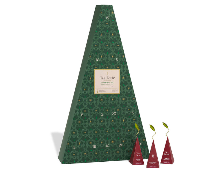 Warming Joy Herbal Advent Calendar with doors closed and infusers to the right outside of box