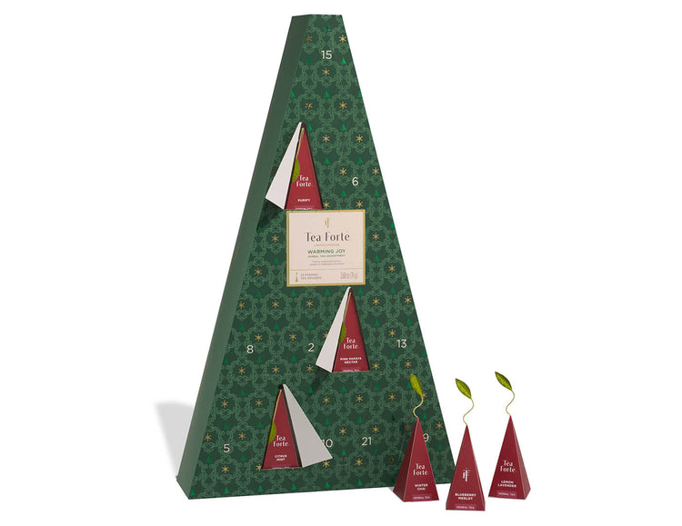 Warming Joy Herbal Advent Calendar with doors open and infusers to the right outside of box