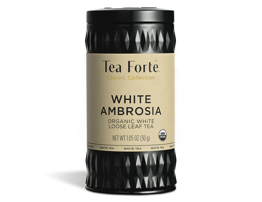 White Ambrosia tea in a canister of loose tea