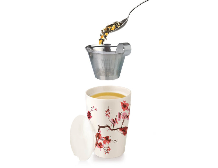 Cherry Blossom design KATI® Steeping cup with infuser showing stainless steel infuser with tea leaves